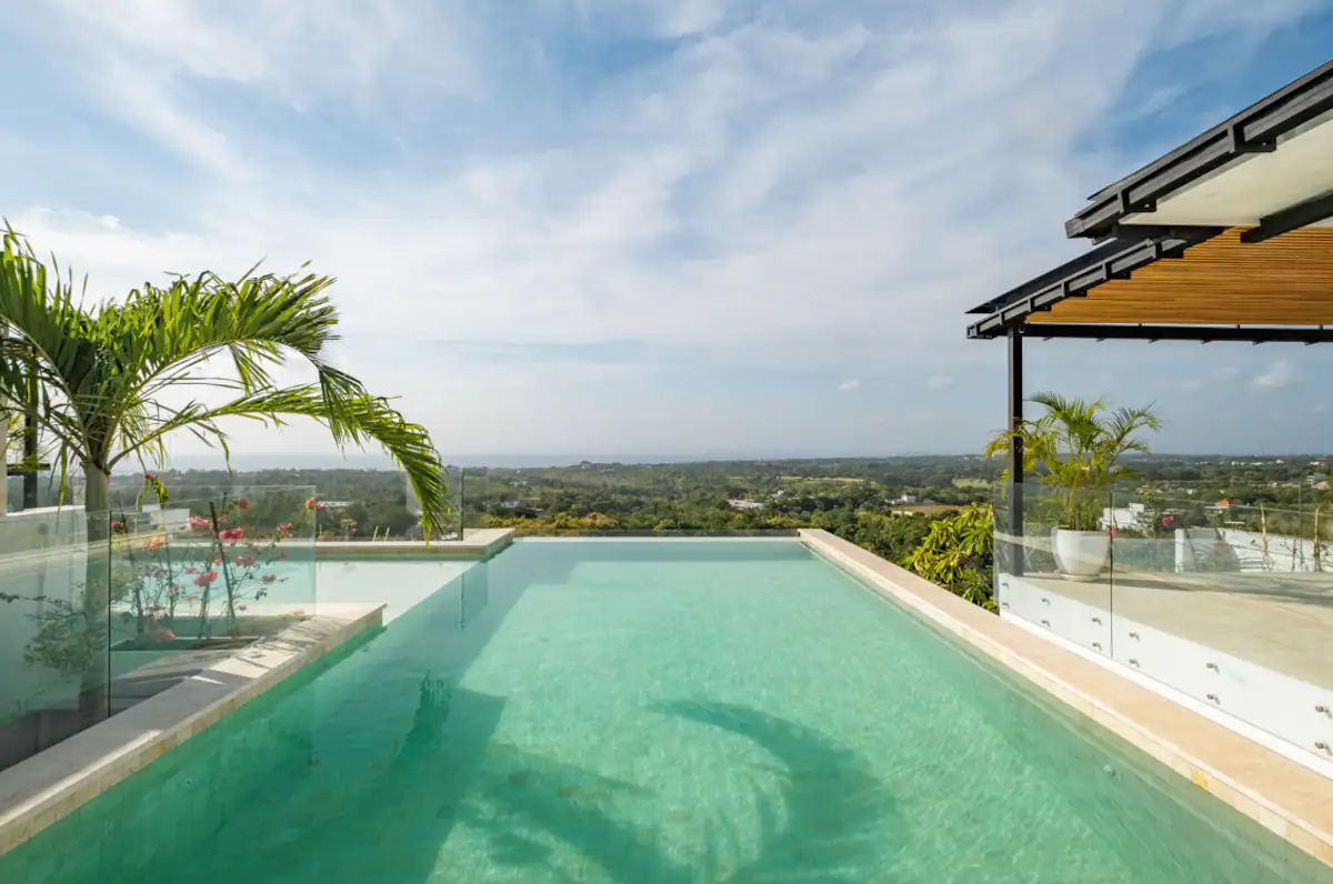 Discover this private 4-bedroom luxury villa on the cliff with ocean view and spa in Bingin, Bali, offering breathtaking ocean views, a rooftop infinity pool, a fully equipped gym, and a private spa. Perfectly designed for monthly or long-term stays, this villa caters to families, groups, and digital nomads seeking the ultimate tropical retreat.